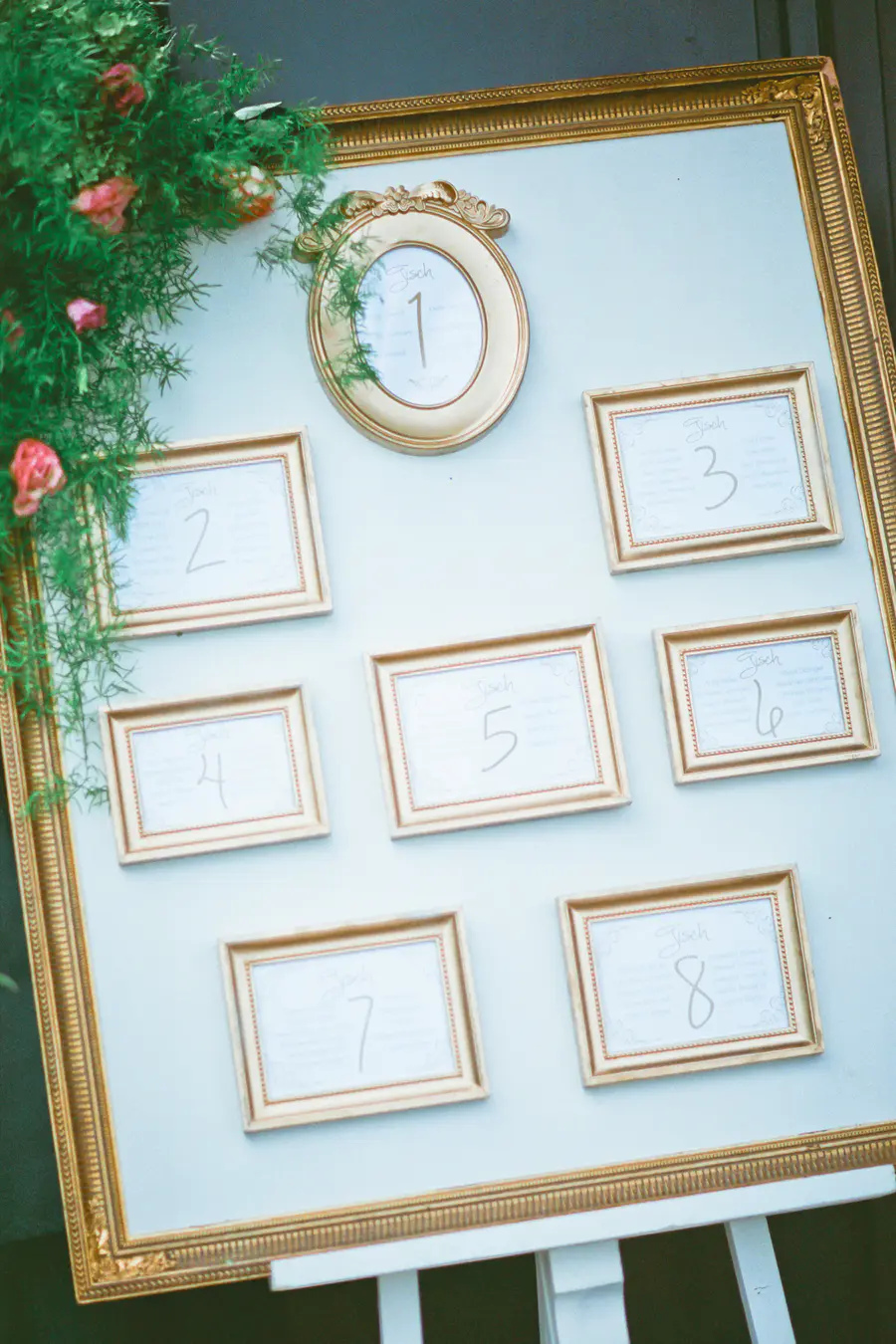 Elegant seating chart with framed table numbers - vintage style