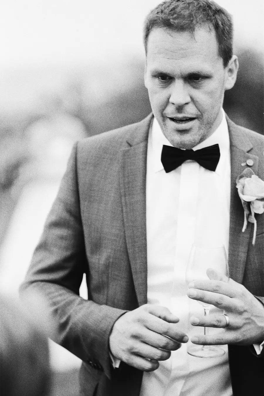 Groom natural portrait captured on Kodak Tri-X 400 Pro, hybrid wedding photography Vienna