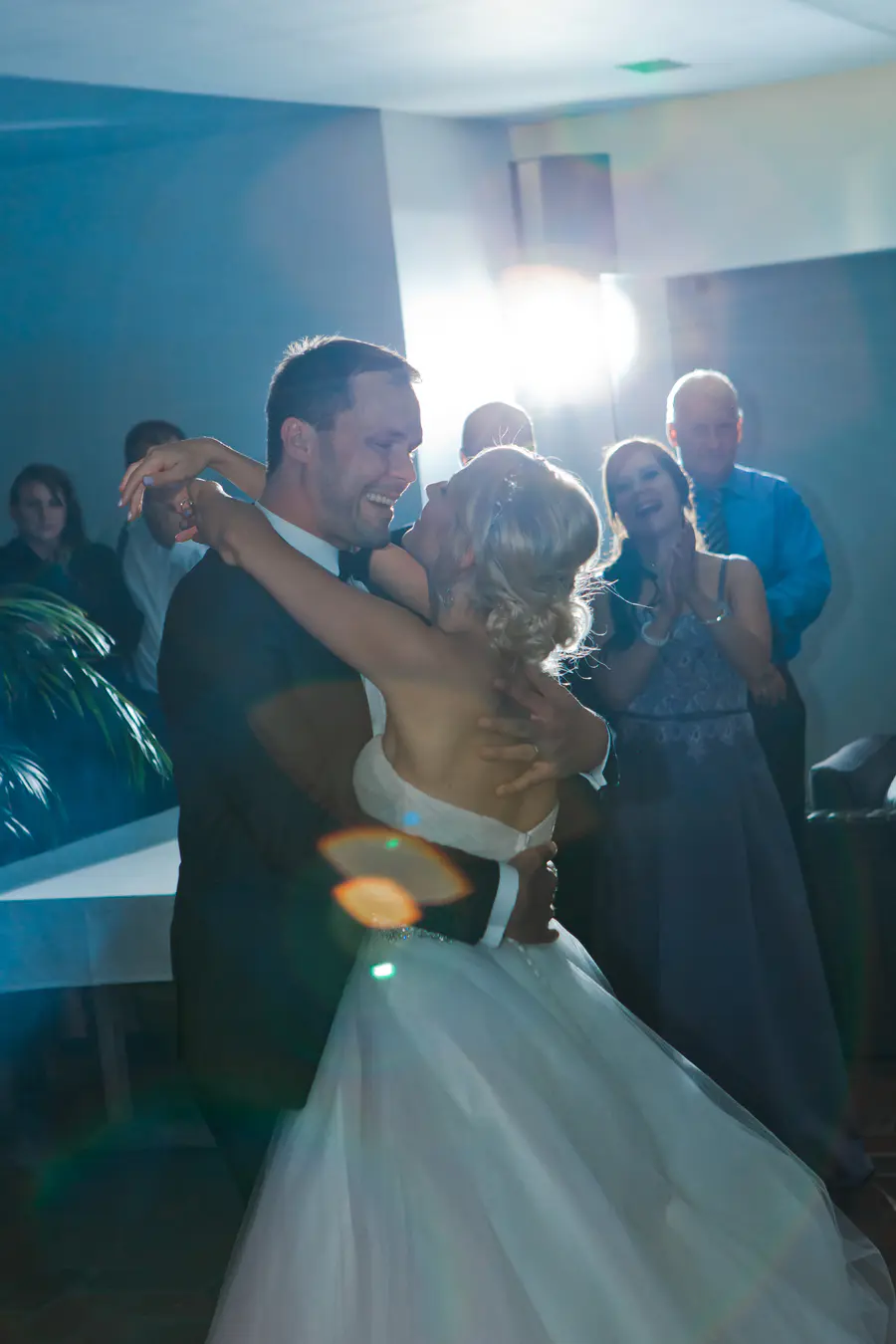 wedding dance groom with bride, first dance, strobist light used