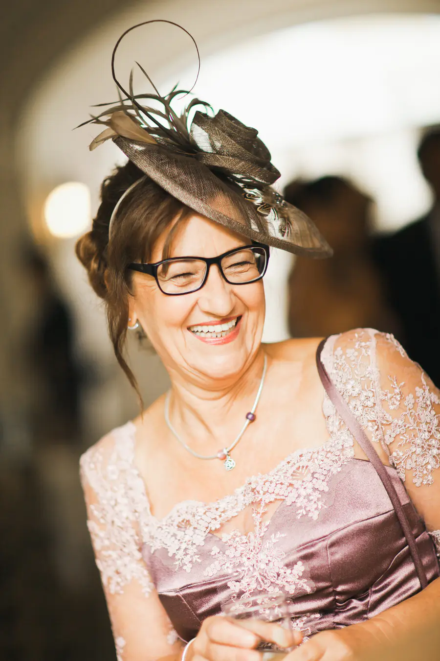 Smiling woman in elegant wedding dress 