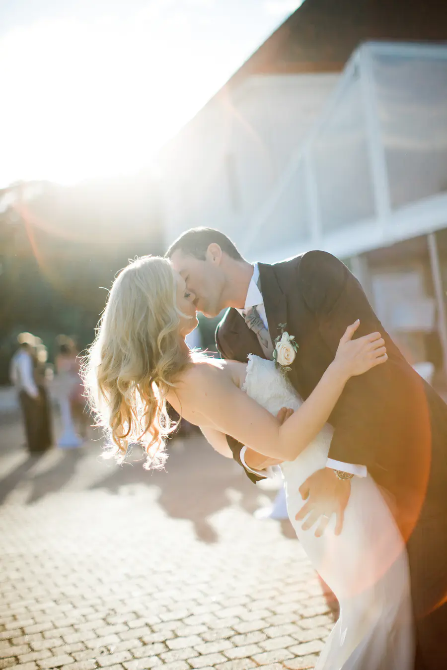 Backlight portrait of a couple during the golden hour, natural  wedding photography.