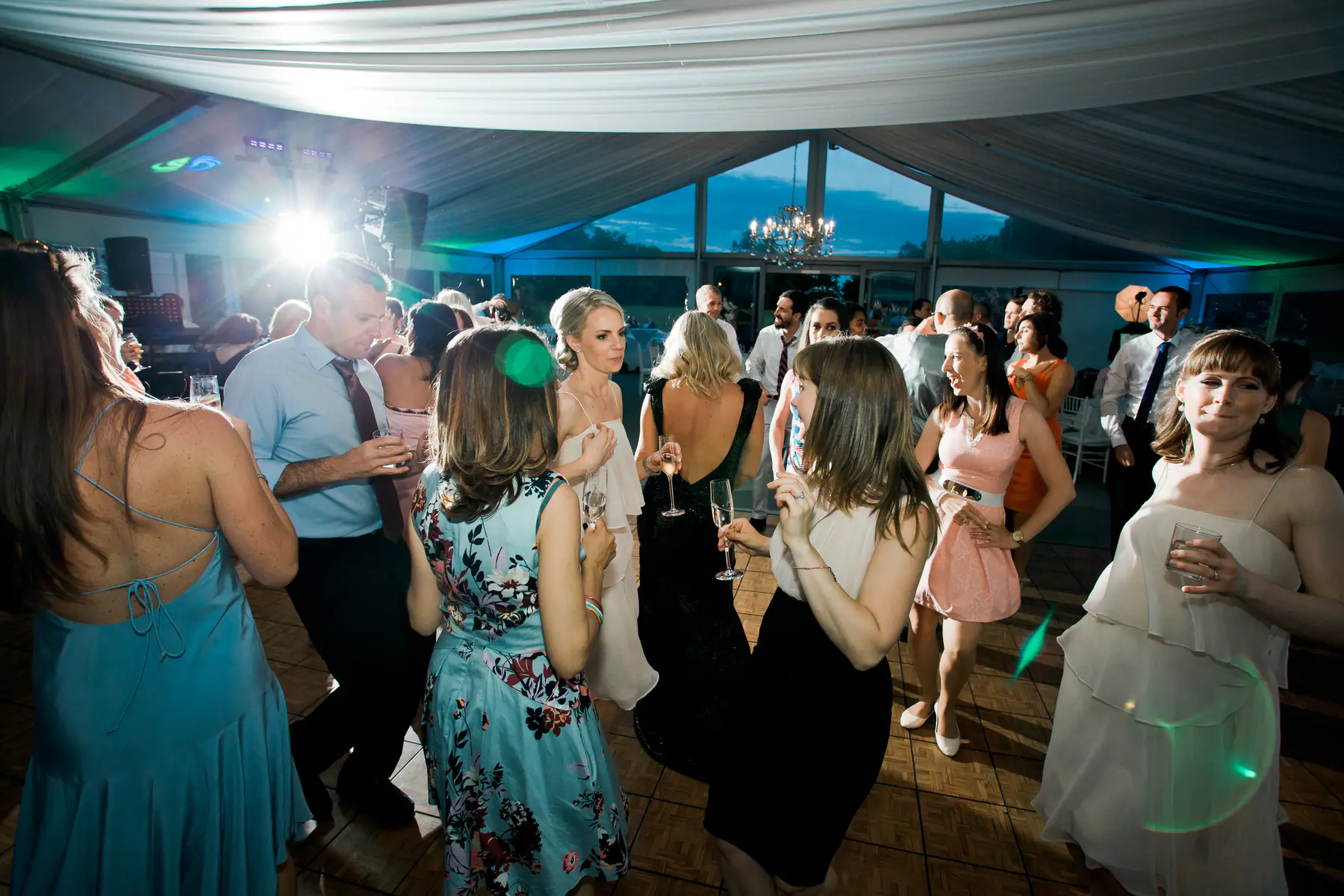 High-energy wedding party photography showing guests dancing and celebrating in Slovakia.Marek and Klára wedding photography