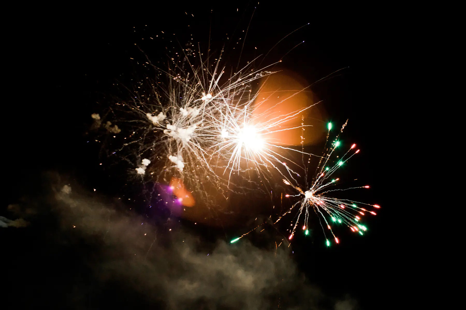 Spectacular wedding fireworks display over the park of Art Hotel Kastiel, romantic night photography Slovakia.
