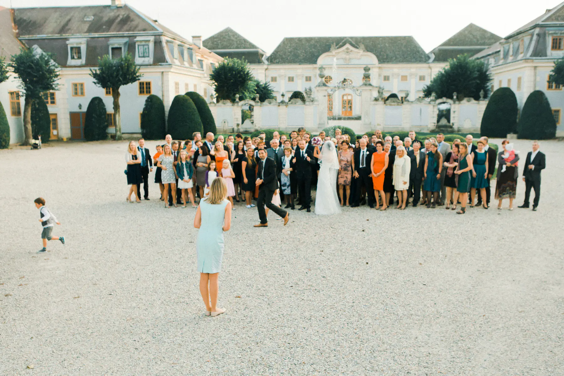 Wedding guests group photo at Schloss Halbturn imperial gardens